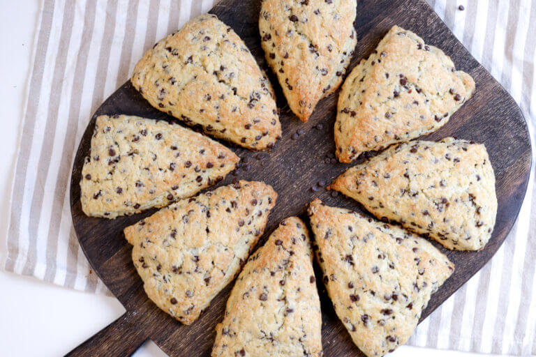 sourdough chocolate chip scones on a wooden board